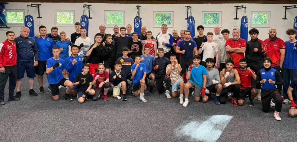 Group photo of boxers and coaches from six nations at the European training camp